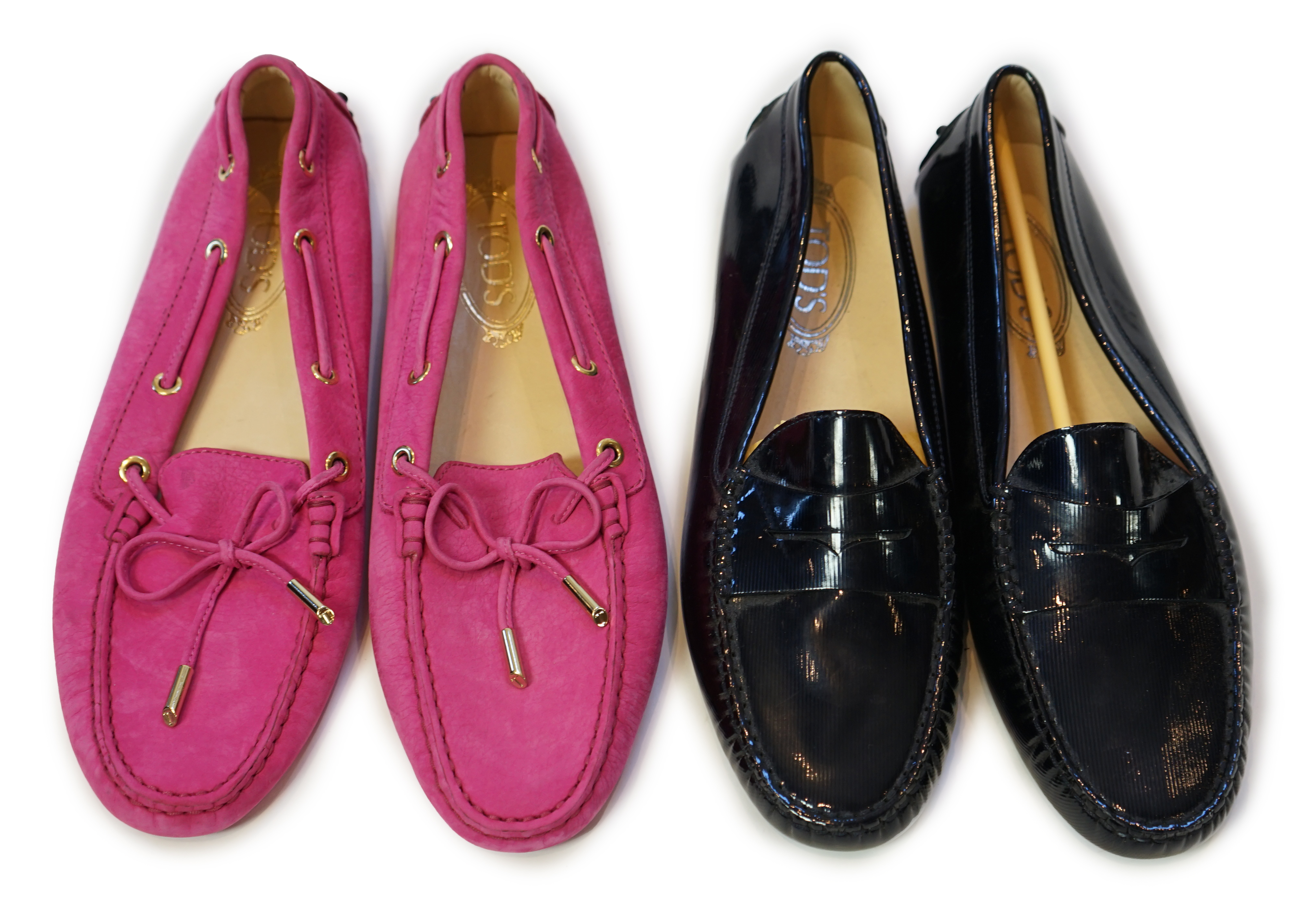 Two pairs of Tod's lady's driving shoes, one pink suede and the other dark blue patient leather, size EU 40